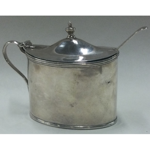 106 - An 18th Century George III silver mustard pot with spoon. London 1798. Approx. 98 grams. Est. £100 -... 