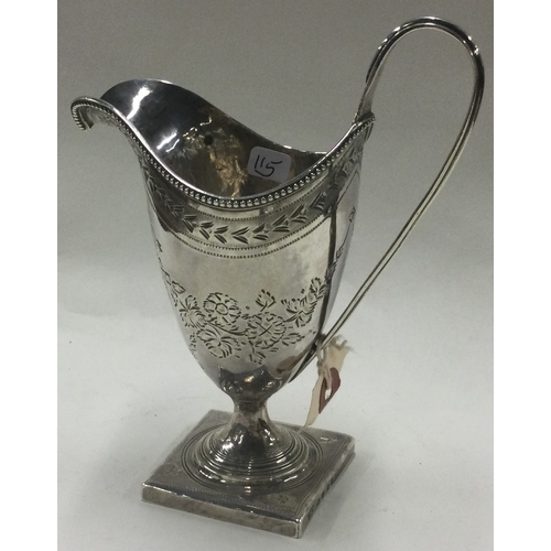 115 - An 18th Century bright cut silver jug. London 1792. By George Gray. Approx. 110 grams. Est. £100 - £... 