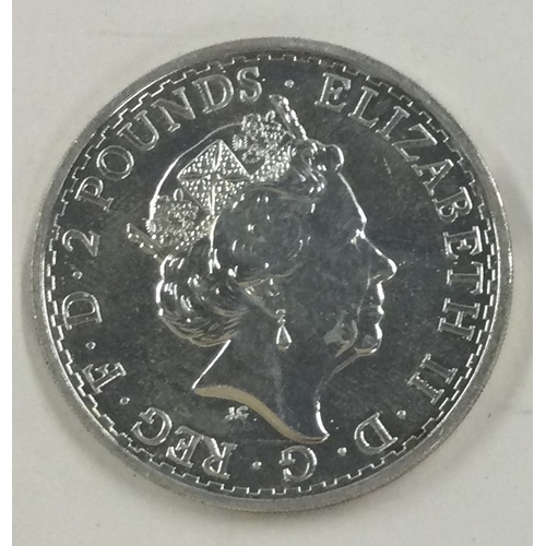 151 - A fine 999 silver Britannia 2 Pounds coin. Approx. 30 grams. Est. £30 - £50.