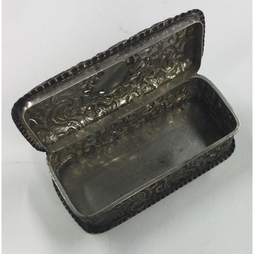 156 - A chased silver box. Marked to base. Birmingham 1912. By Henry Matthews. Approx. 72 grams. Est. £50 ... 