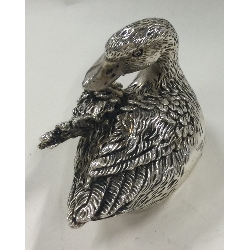 158 - A heavy silver figure of a duck. Marked to side. Approx. 122 grams. Est. £30 - £50.