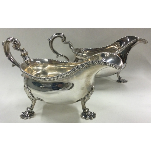 206 - A fine pair of 18th Century silver sauce boats. London 1762. By Albert Schurman. Approx. 708 grams. ... 