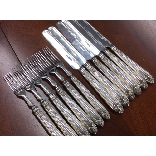 239 - A set of six Victorian silver knives and forks. Sheffield 1870. By Harrison Brothers. Approx. 485 gr... 