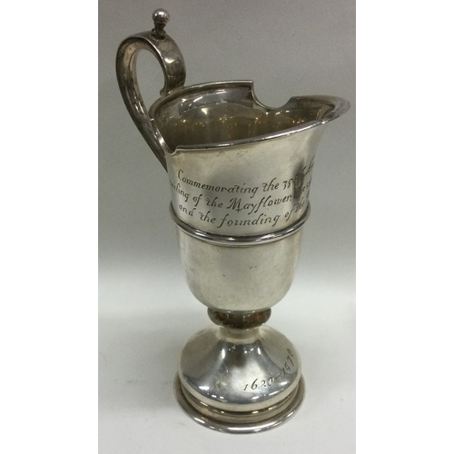 255 - A silver jug to commemorate the 50th Anniversary of the sailing of the Mayflower. London 1969. Appro... 