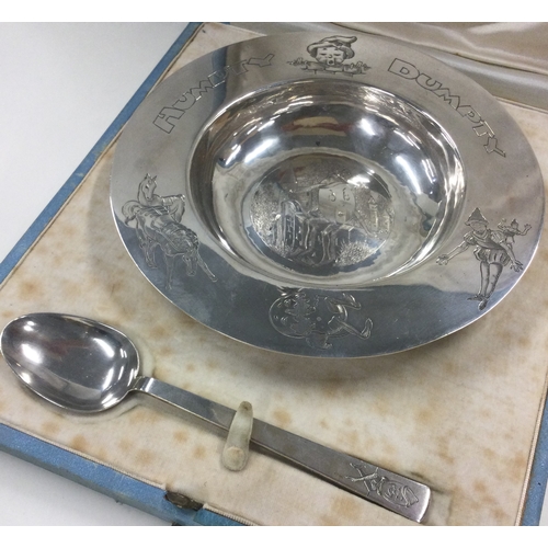 267 - ASPREY & CO: A cased 'Humpty Dumpty' silver christening plate and spoon in original box. London 1958... 