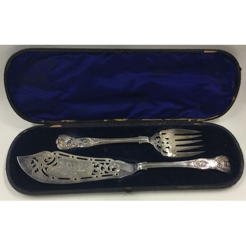 268 - A cased pair of silver servers engraved with swans. London 1872. By Thomas Smiley. Approx. 264 grams... 