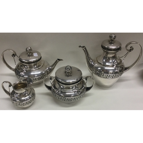 273 - A fine and decorative French silver four piece bachelor tea set. Circa 1900. Approx. 867 grams. Est.... 