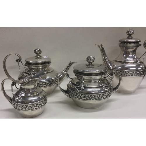 273 - A fine and decorative French silver four piece bachelor tea set. Circa 1900. Approx. 867 grams. Est.... 