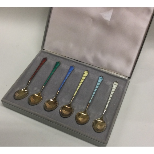 278 - A set of six cased Norwegian silver and enamelled spoons. Approx. 60 grams. Est. £80 - £120.