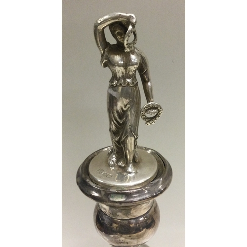 285 - A heavy late Victorian silver figure of a lady. Approx. 94 grams. Est. £60 - £80.