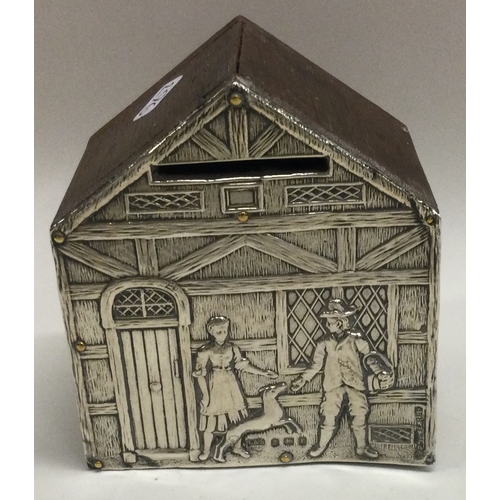 296 - A silver money box in the form of a house. Birmingham 1905. By Levi and Salaman. Approx. 109 grams. ... 