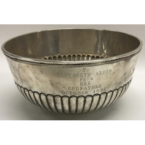 344 - WANG HING: A heavy fluted 19th Century Chinese export silver bowl. Marked to base and dated 1897. Ap... 