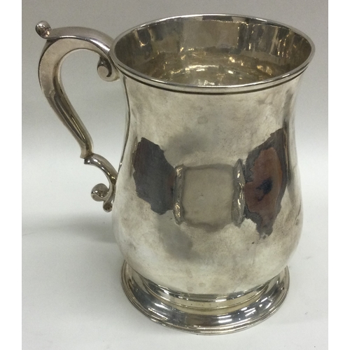 354 - An 18th Century George III silver baluster shaped pint mug. London 1750. Approx. 290 grams. Est. £40... 