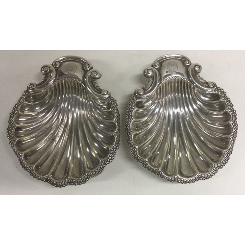 357 - A pair of Victorian silver butter shells. London 1890. By Horace Woodward & Co. Approx. 170 grams. E... 