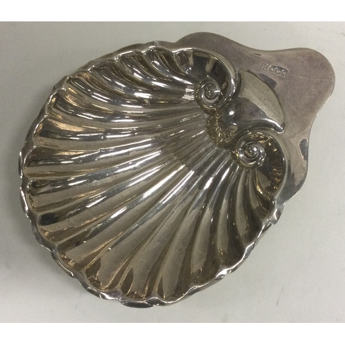 358 - A silver fluted butter shell. Sheffield 1918. By James Deakin & Sons. Approx. 38 grams. Est. £30 - £... 