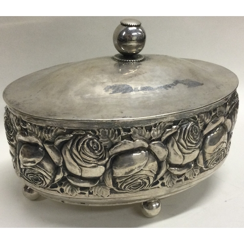 359 - A large Austrian silver tea caddy embossed with flowers. Approx. 328 grams. Est. £300 - £500.