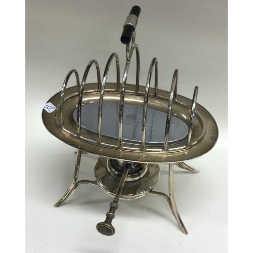 378 - An unusual silver travelling toast rack. Birmingham. By Aspreys. Approx. 393 grams. Est. £300 - £400... 