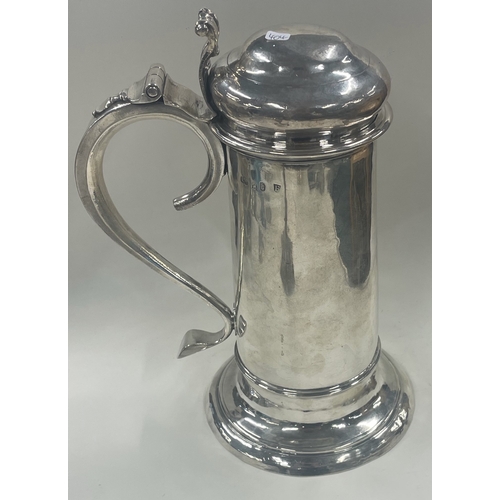 404 - A good quality Britannia Standard George I silver flagon. London 1721. By SA. Approx. 1250 grams. Es... 