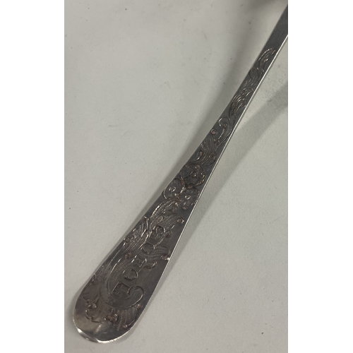 41 - A chased George III silver berry sifter spoon. London 1803. By William Eley & William Fearn. Approx.... 