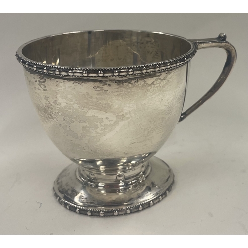 411 - CHESTER: A Glastonbury silver christening mug. 1911. By Barker Brothers. Approx. 107 grams. Est. £12... 