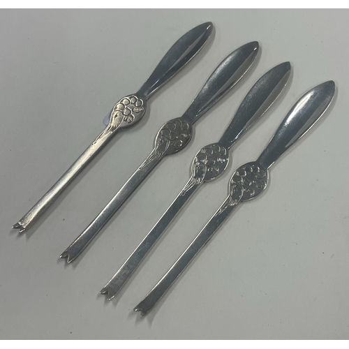 412 - A set of four silver lobster picks. Sheffield 1931. By Thomas Bradbury & Sons. Approx. 41 grams. Est... 