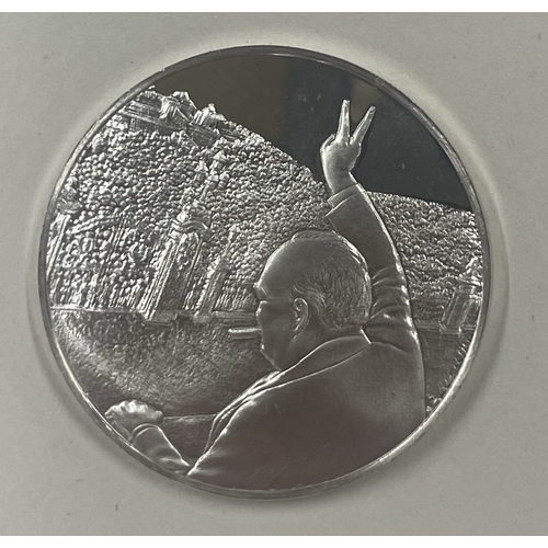 415 - A silver coin commemorating VE Day 8th May 1945 depicting Winston Churchill. Approx. 15 grams. Est. ... 