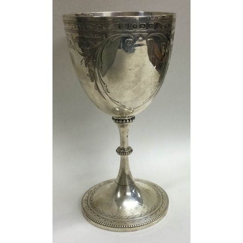 442 - An ornate Victorian silver engraved goblet. Birmingham 1888. By T Wooley. Approx. 156 grams. Est. £2... 