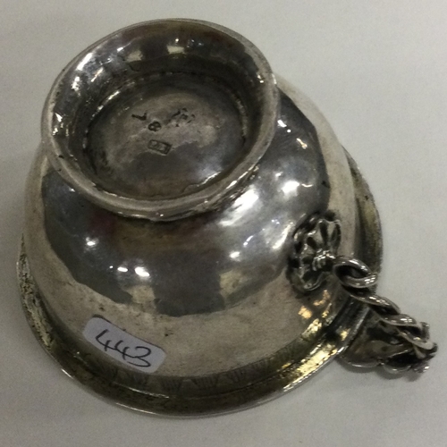 443 - An 18th Century Swedish silver engraved cup. Marked to base. Approx. 37 grams. Est. £80 - £120.