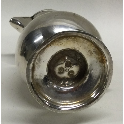 448 - An 18th Century Georgian silver sparrow cream jug. London 1778. Approx. 72 grams. Est. £300 - £500.