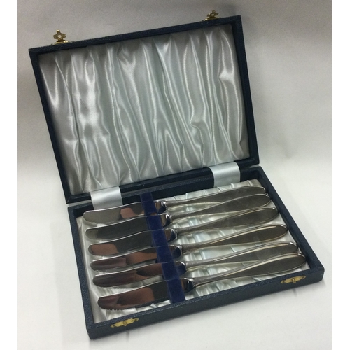 47 - A set of six Norwegian silver cased table knives bearing import marks, Approx. 304 grams. Est. £40 -... 