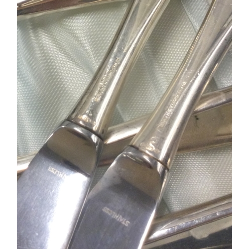 47 - A set of six Norwegian silver cased table knives bearing import marks, Approx. 304 grams. Est. £40 -... 