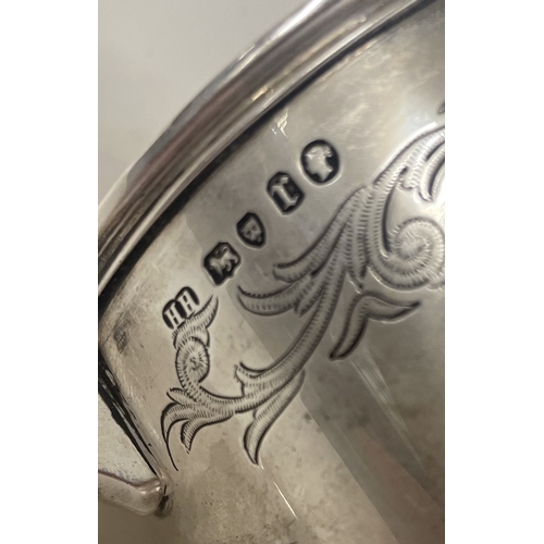 48 - A large Victorian silver engraved presentation pint mug. London 1872. By Henry Holland. Approx. 293 ... 