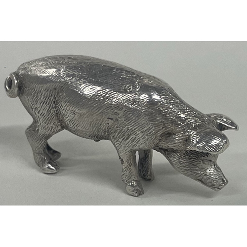 57 - An early 20th Century English silver figure of a pig. Approx. 30 grams. Est. £40 - £60.