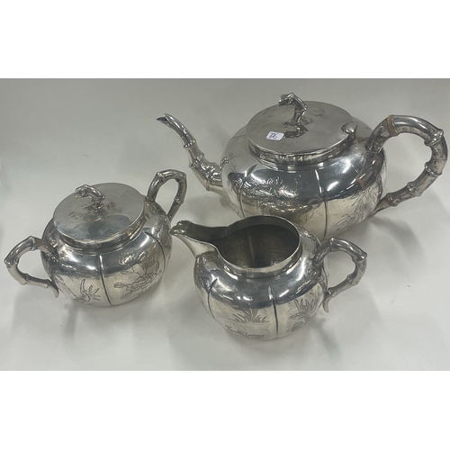 396 - A Chinese silver tea set engraved with birds. Circa 1880. Marked to base. By SW. Approx. 843 grams. ... 