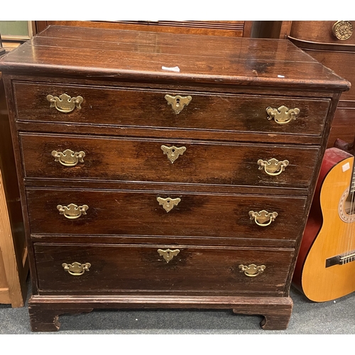 10 - A Georgian oak four drawer chest. Est. £50 - £80.