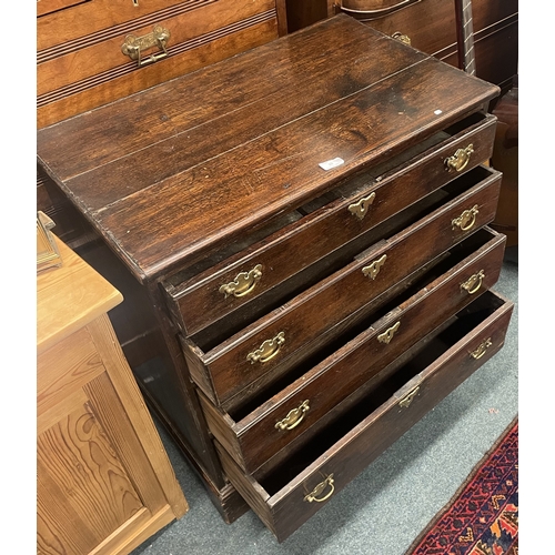 10 - A Georgian oak four drawer chest. Est. £50 - £80.