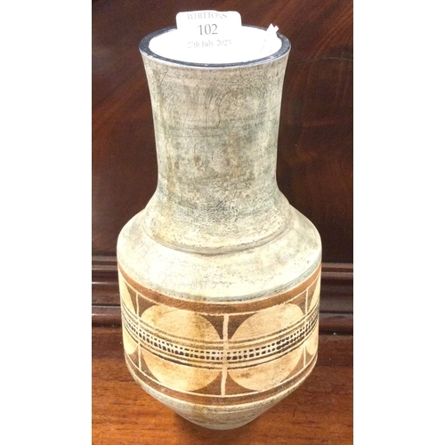 102 - TROIKA: A stylish pottery vase of typical form. Est. £50 - £80.