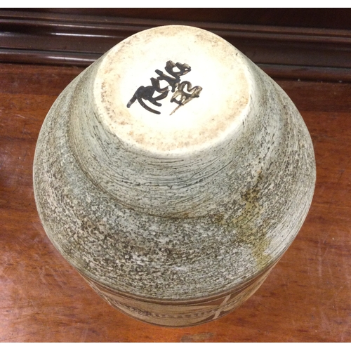 102 - TROIKA: A stylish pottery vase of typical form. Est. £50 - £80.