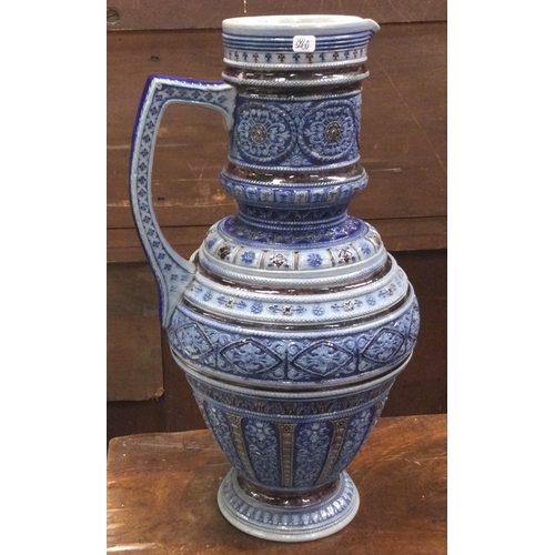 116 - A large blue ground German stein. Est. £20 - £30.