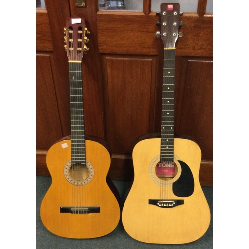 13 - Two old guitars. Est. £20 - £30.