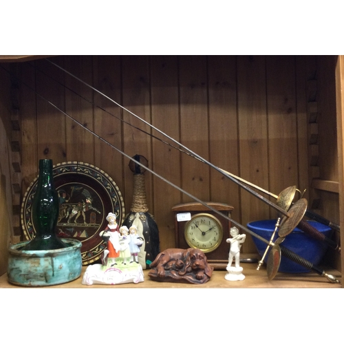 14 - A collection of pottery, clocks and swords. Est. £20 - £30.