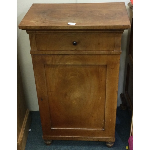 16 - A Continental single drawer cupboard. Est. £40 - £50.