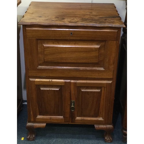 17 - A Continental drop flap cupboard. Est. £20 - £30.