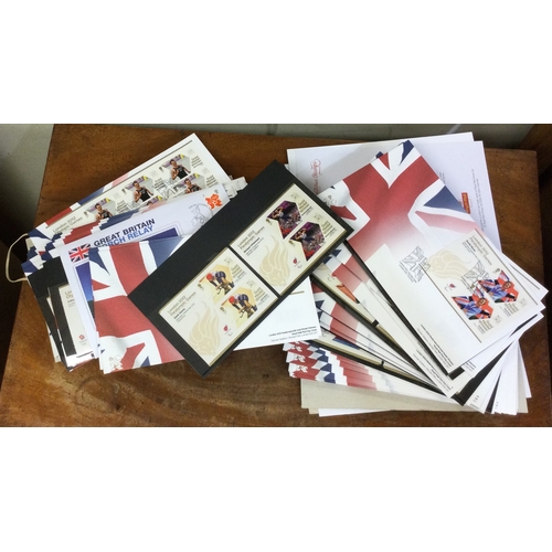 23 - A large collection of Olympic first day cover stamps. Est. £20 - £30.