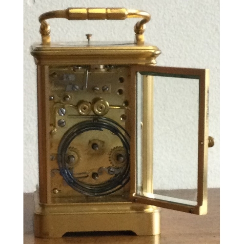 251 - A good French carriage clock with white enamel dial. By Le Roy. Est. £150 - £200.