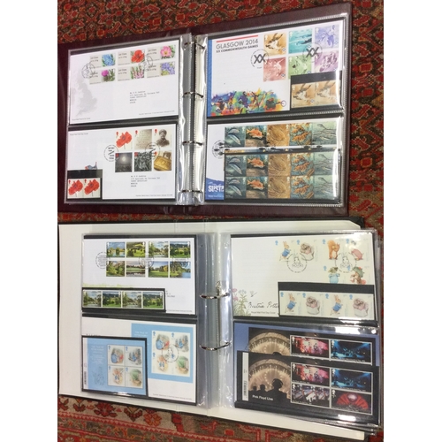 32 - A folder containing UK first day covers from 2014 - 2018. Est. £20 - £30.