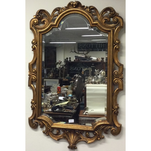 35 - A large gilt framed mirror. Est. £40 - £60.