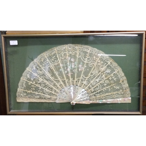 7 - A cased MOP fan. Est. £30 - £50.