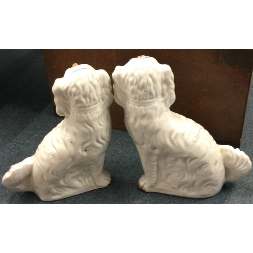 95 - A pair of Staffordshire dogs. Est. £20 - £30.