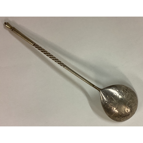 100 - An engraved Russian silver spoon with spiral handle. Circa 1900. Approx. 22 grams. Est. £40 - £60.